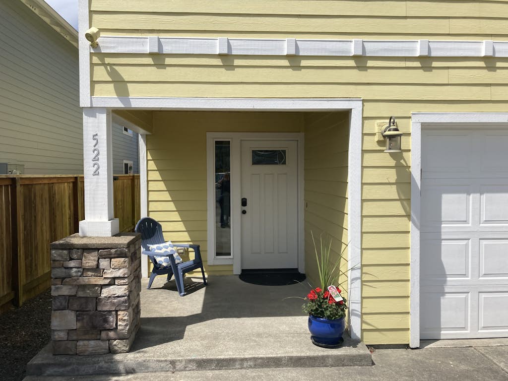 Serene riverfront home with gas fireplace, W/D, balcony, patio, & board games