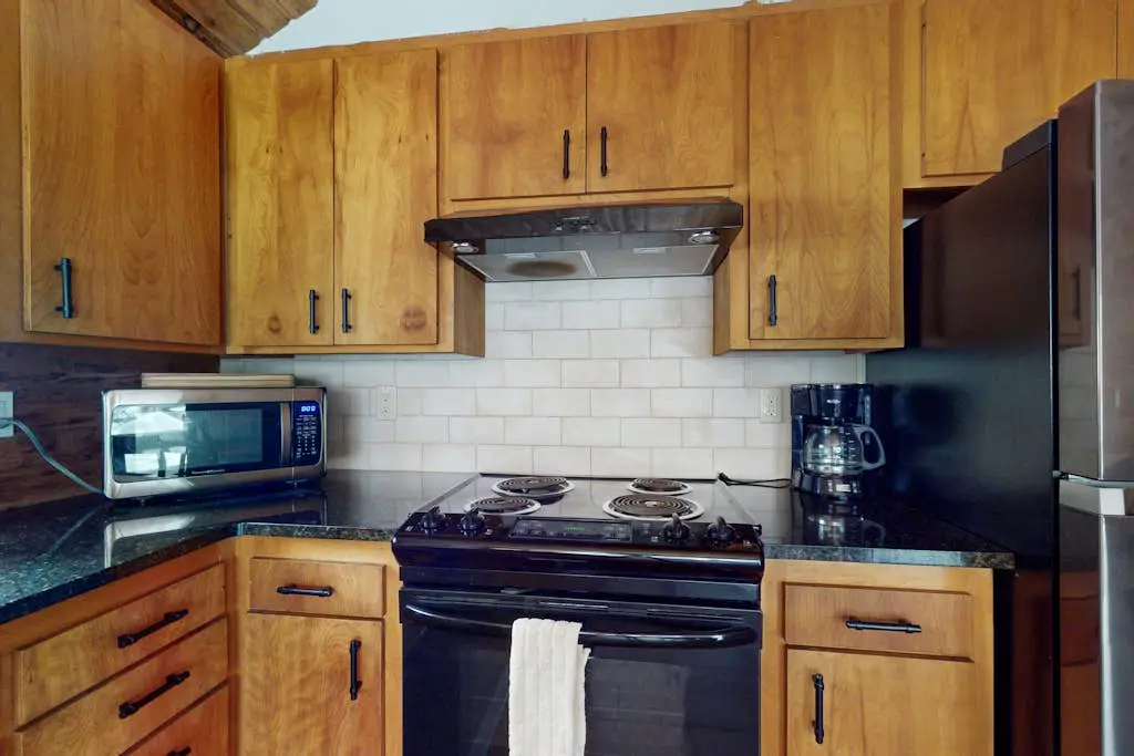 Dog-friendly house with pool, hot tub, fitness room, fireplace, grill, & deck