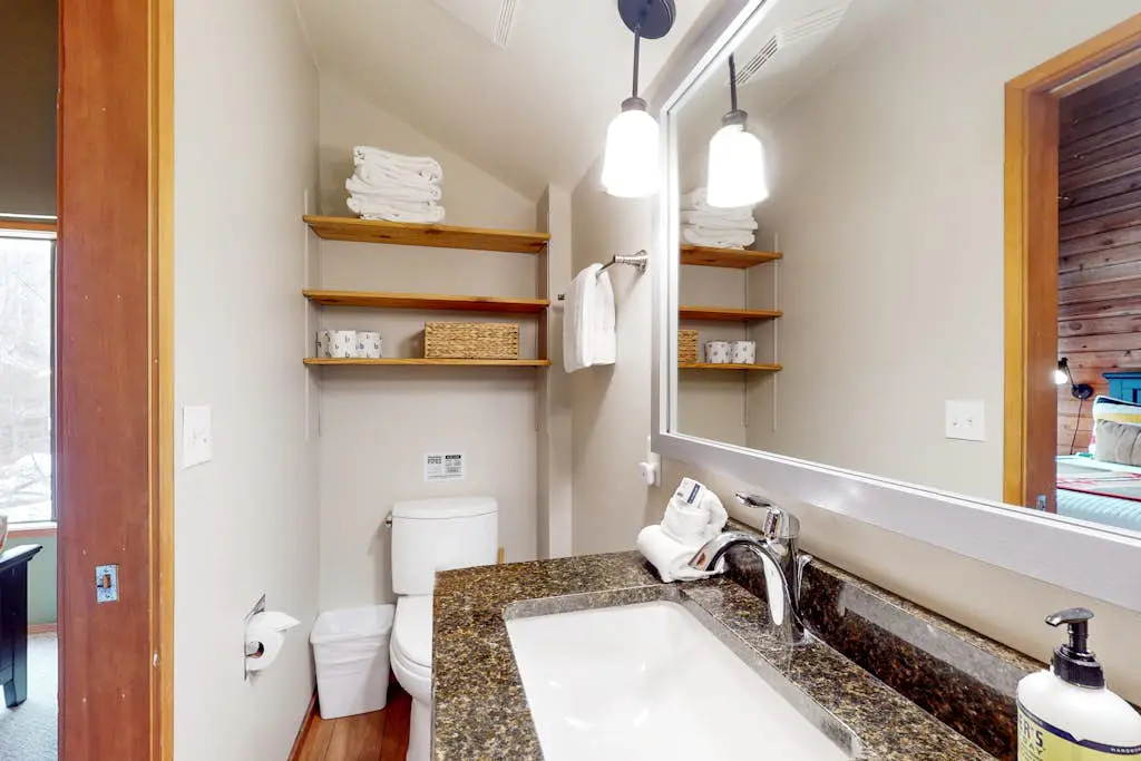 Dog-friendly house with pool, hot tub, fitness room, fireplace, grill, & deck