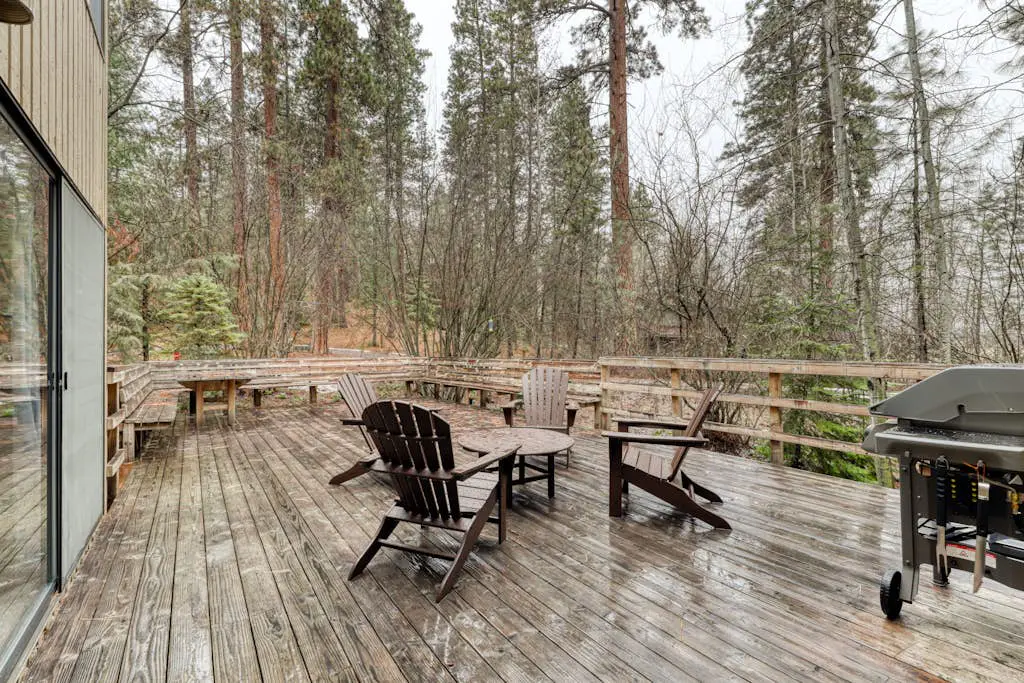 Dog-friendly house with pool, hot tub, fitness room, fireplace, grill, & deck