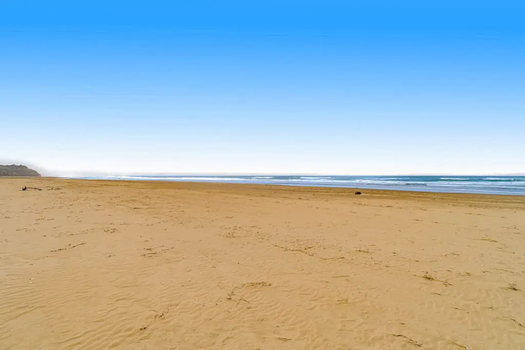 Spacious oceanfront home with free WiFi, and wrap-around deck