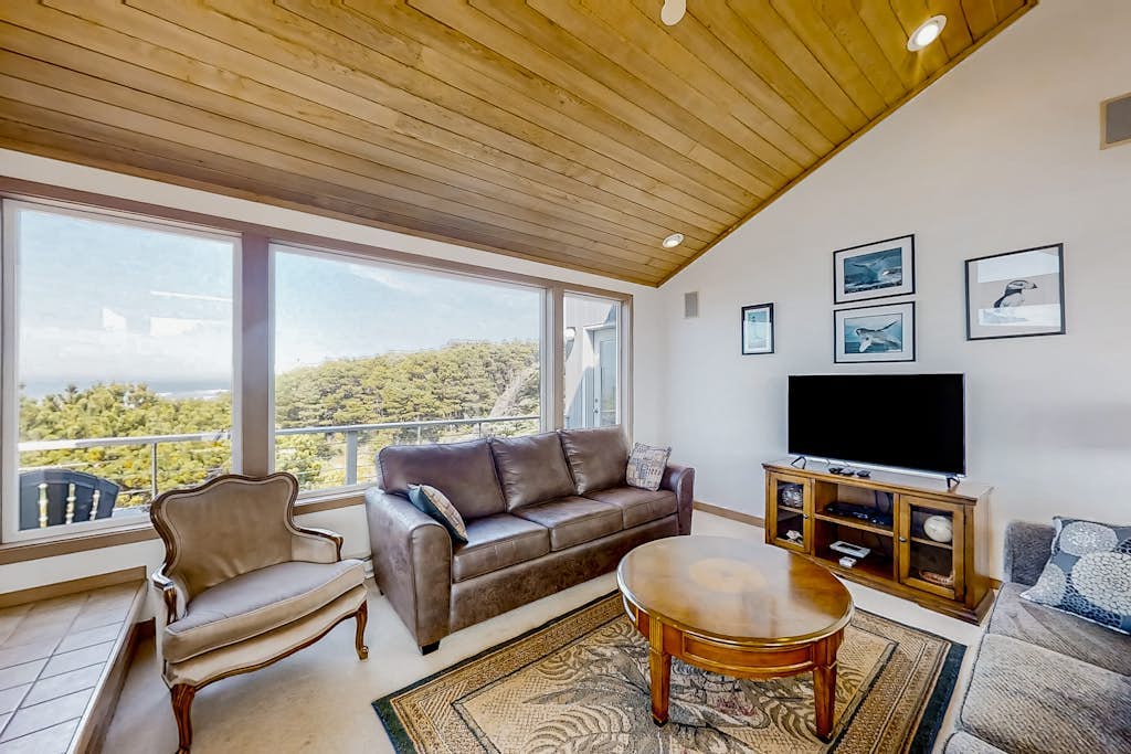 Spacious oceanfront home with free WiFi, and wrap-around deck