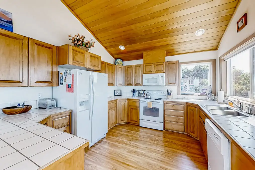 Spacious oceanfront home with free WiFi, and wrap-around deck