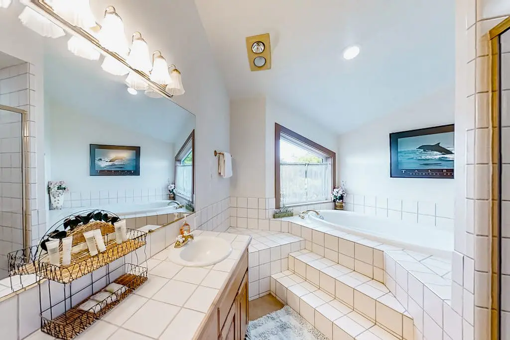 Spacious oceanfront home with free WiFi, and wrap-around deck