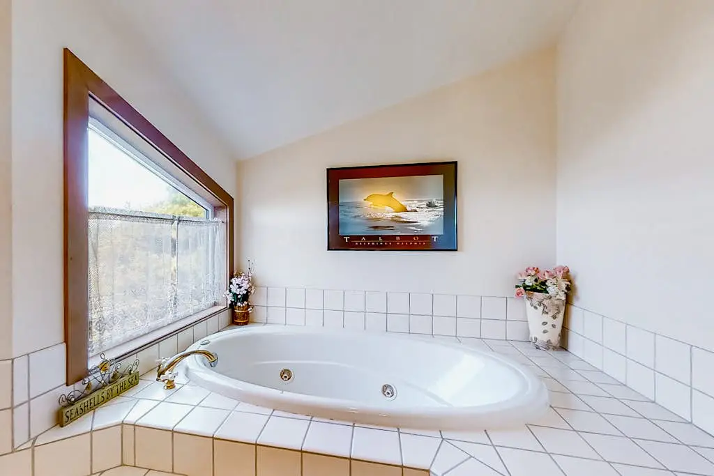 Spacious oceanfront home with free WiFi, and wrap-around deck