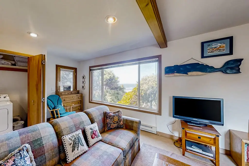 Spacious oceanfront home with free WiFi, and wrap-around deck