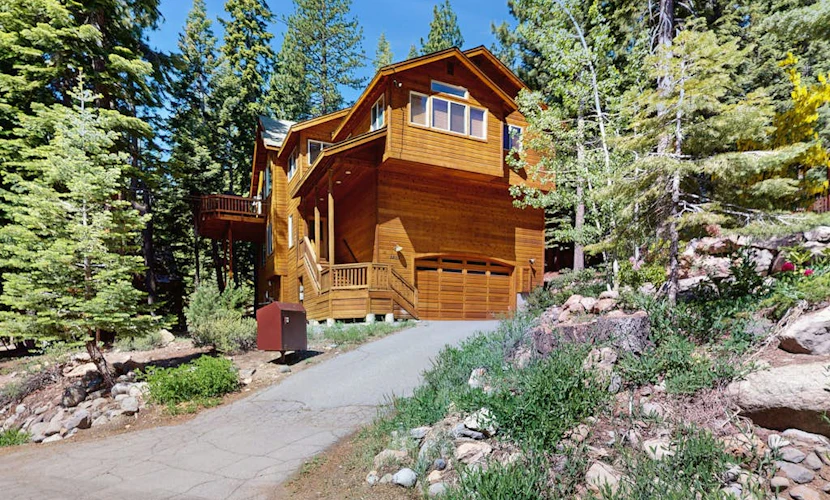 Gorgeous family home surrounded by trees w/ a furnished deck & BBQ