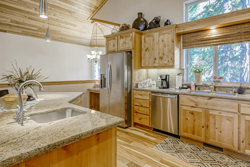 Inviting spacious home with fireplace, deck, hot tub, full kitchen, & W&D