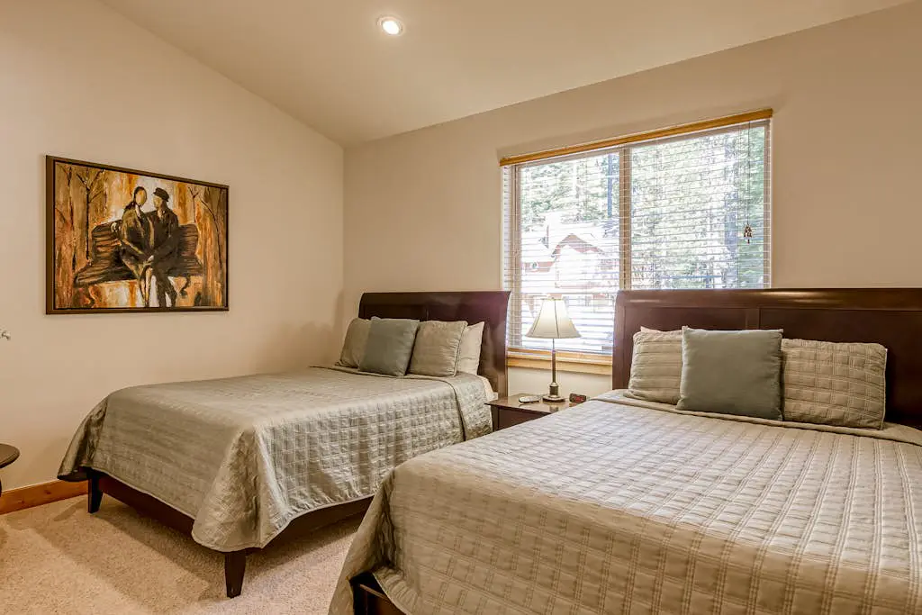 Inviting spacious home with fireplace, deck, hot tub, full kitchen, & W&D