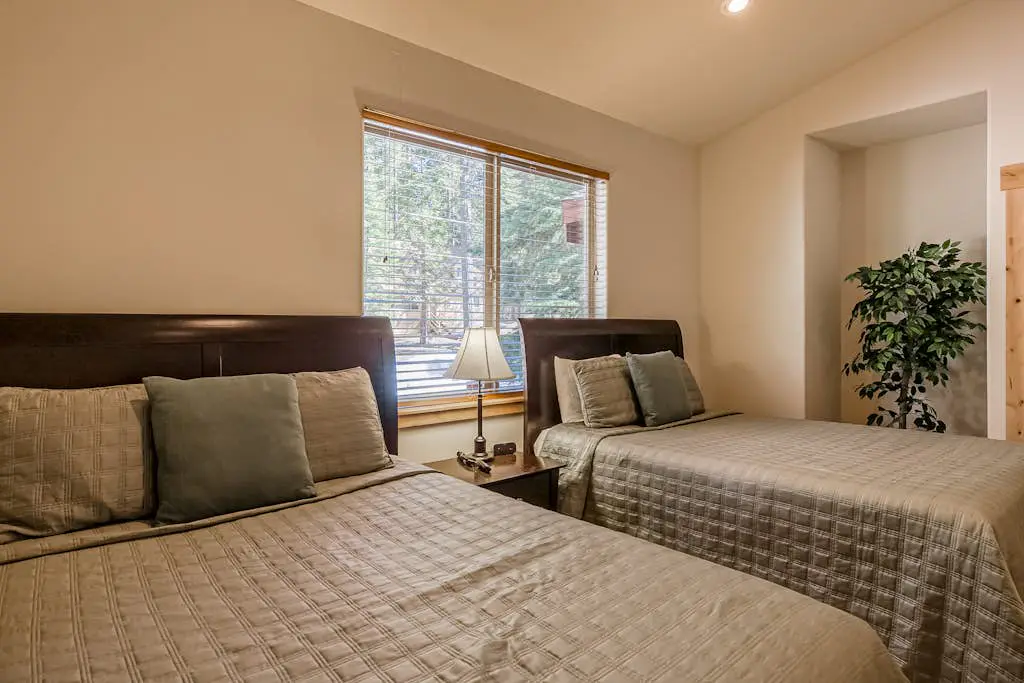 Inviting spacious home with fireplace, deck, hot tub, full kitchen, & W&D