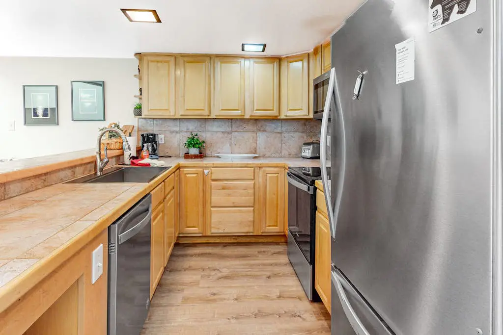 Two-Level Condo with Shared Outdoor Pool, Free WiFi, Fireplace, & washer&dryer