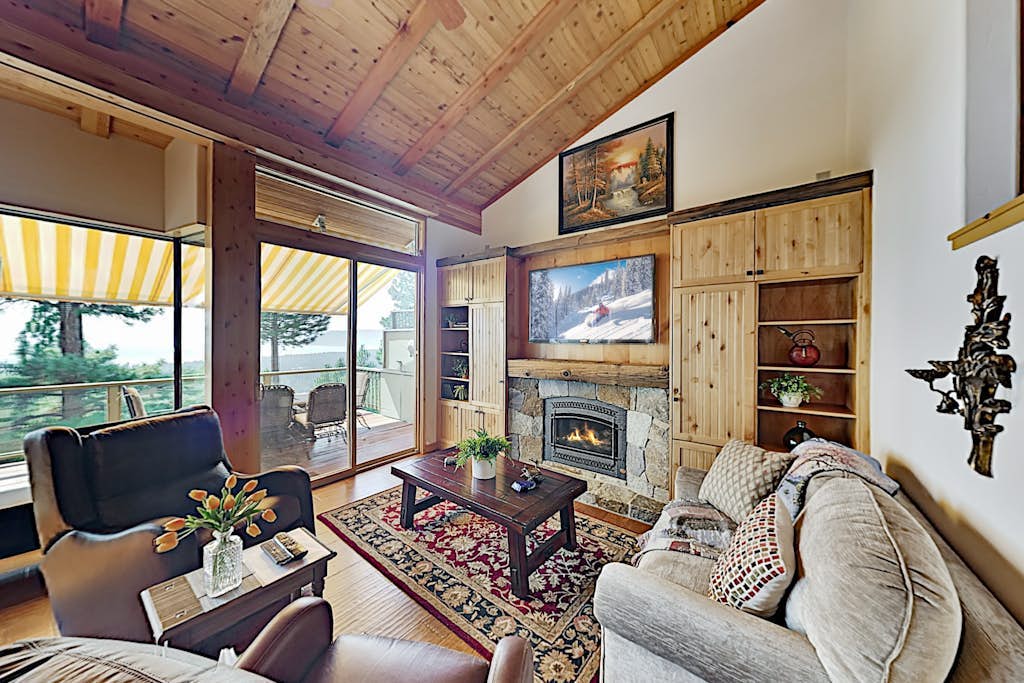 Custom, luxe condo with panoramic lake & mountain views & fireplaces