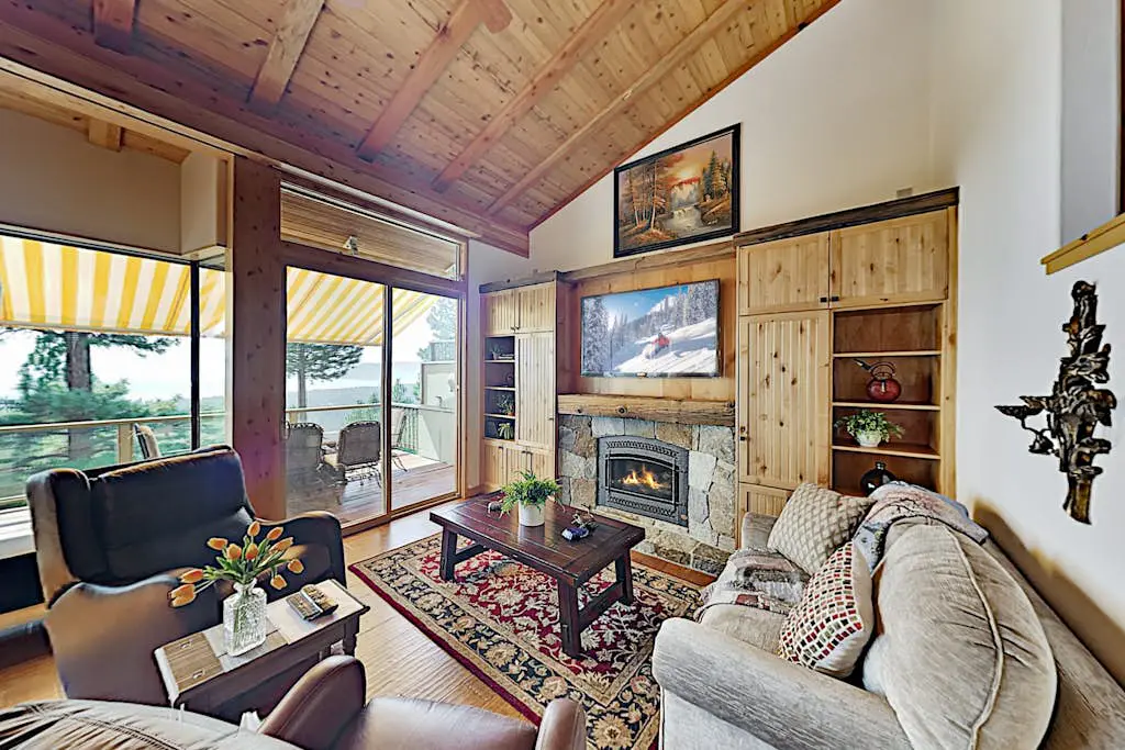 Custom, luxe condo with panoramic lake & mountain views & fireplaces