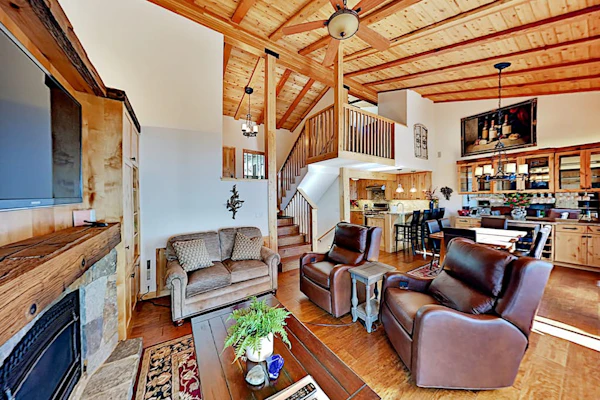 Custom, luxe condo with panoramic lake & mountain views & fireplaces