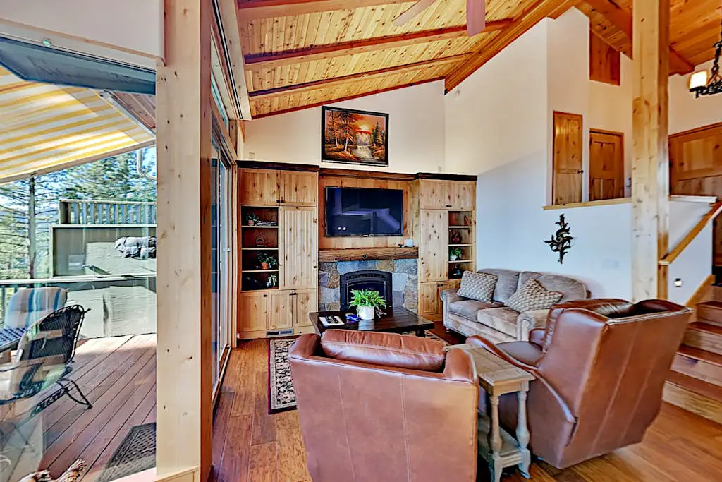 Custom, luxe condo with panoramic lake & mountain views & fireplaces
