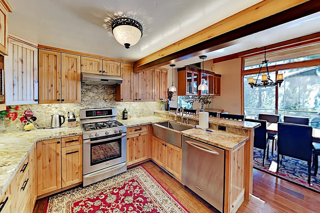 Custom, luxe condo with panoramic lake & mountain views & fireplaces