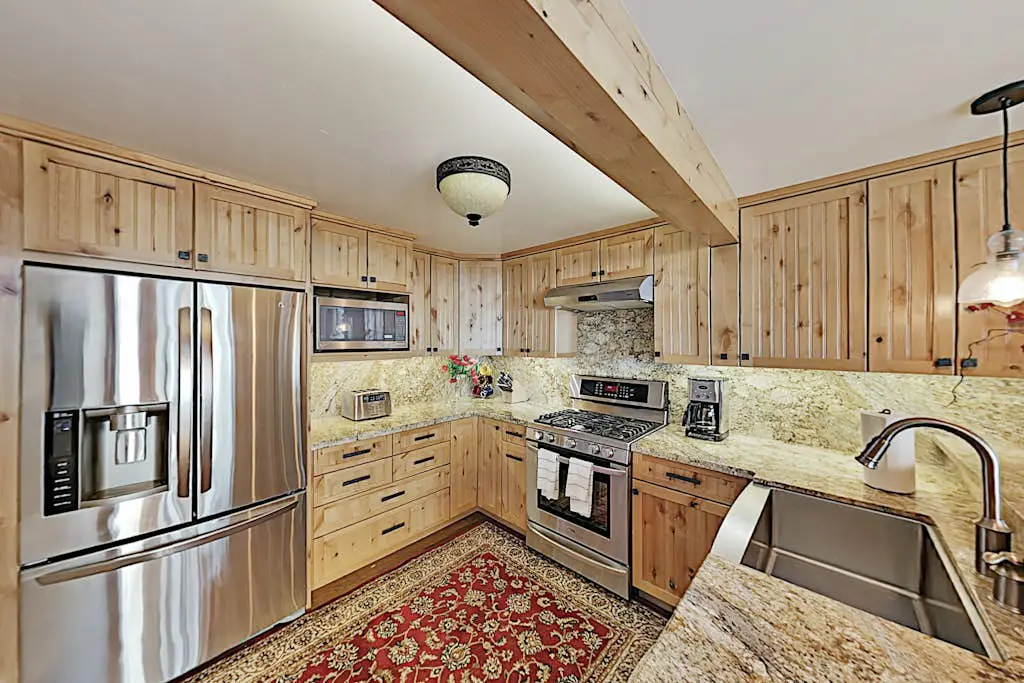 Custom, luxe condo with panoramic lake & mountain views & fireplaces