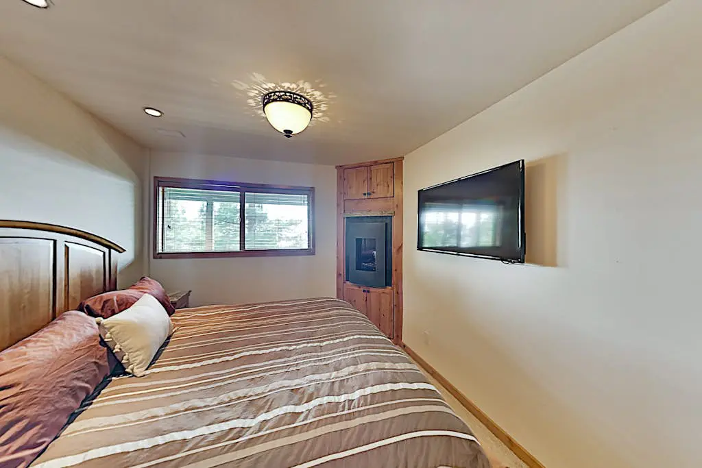 Custom, luxe condo with panoramic lake & mountain views & fireplaces