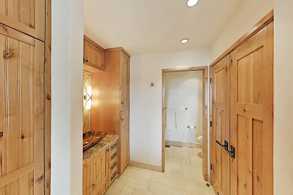 Custom, luxe condo with panoramic lake & mountain views & fireplaces