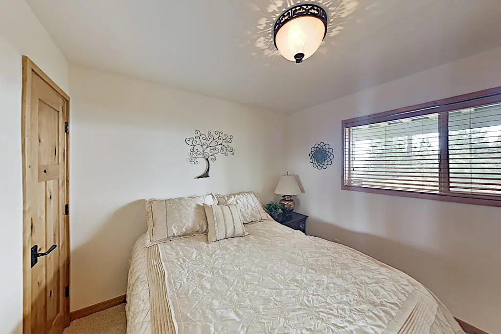 Custom, luxe condo with panoramic lake & mountain views & fireplaces