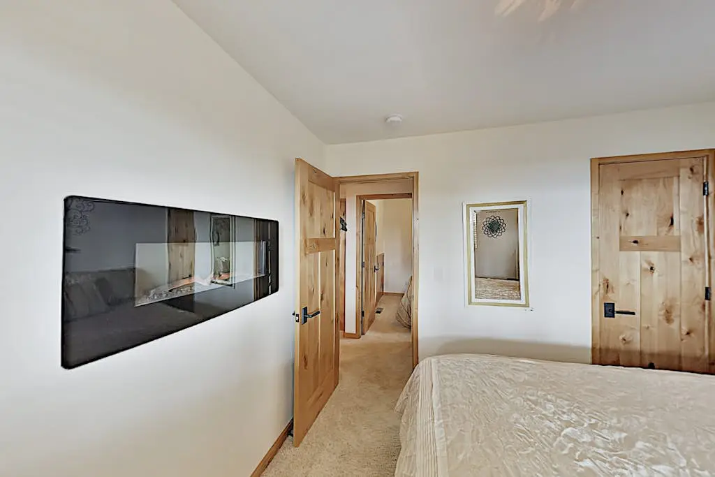 Custom, luxe condo with panoramic lake & mountain views & fireplaces