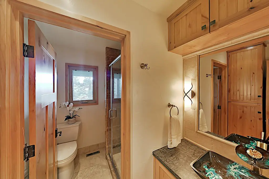 Custom, luxe condo with panoramic lake & mountain views & fireplaces