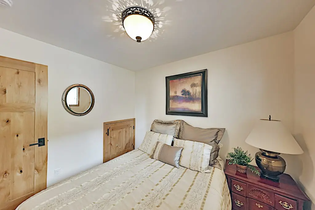 Custom, luxe condo with panoramic lake & mountain views & fireplaces