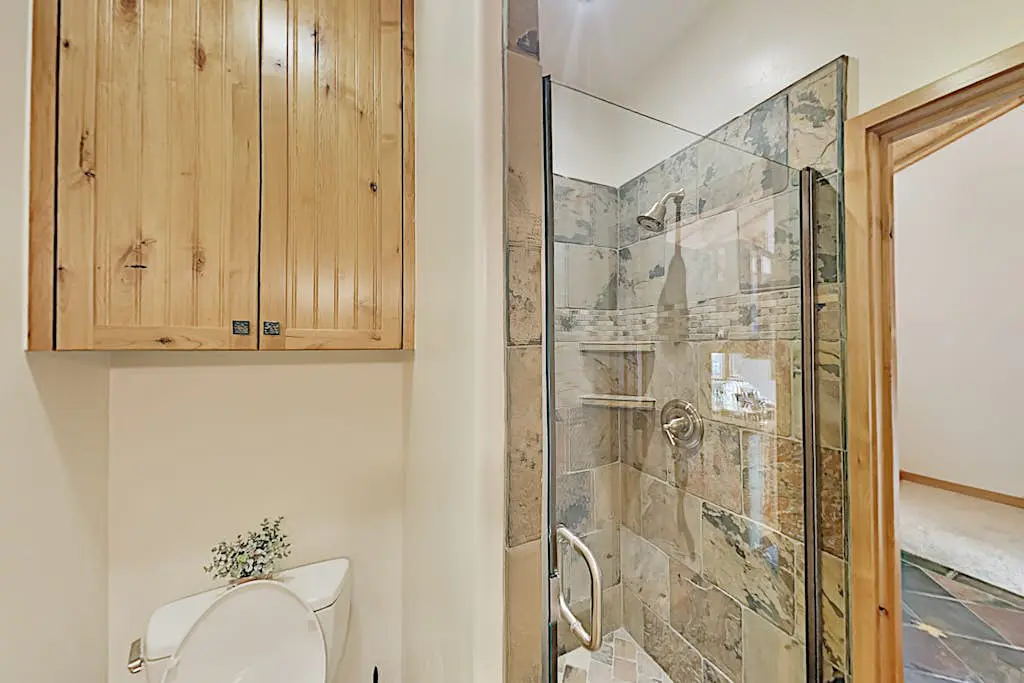Custom, luxe condo with panoramic lake & mountain views & fireplaces