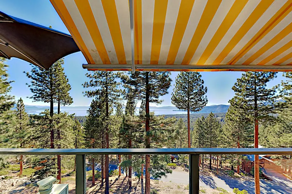 Custom, luxe condo with panoramic lake & mountain views & fireplaces