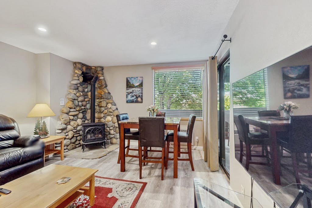 Woodsy condo near skiing with beach access, pool, hot tub, & WiFi