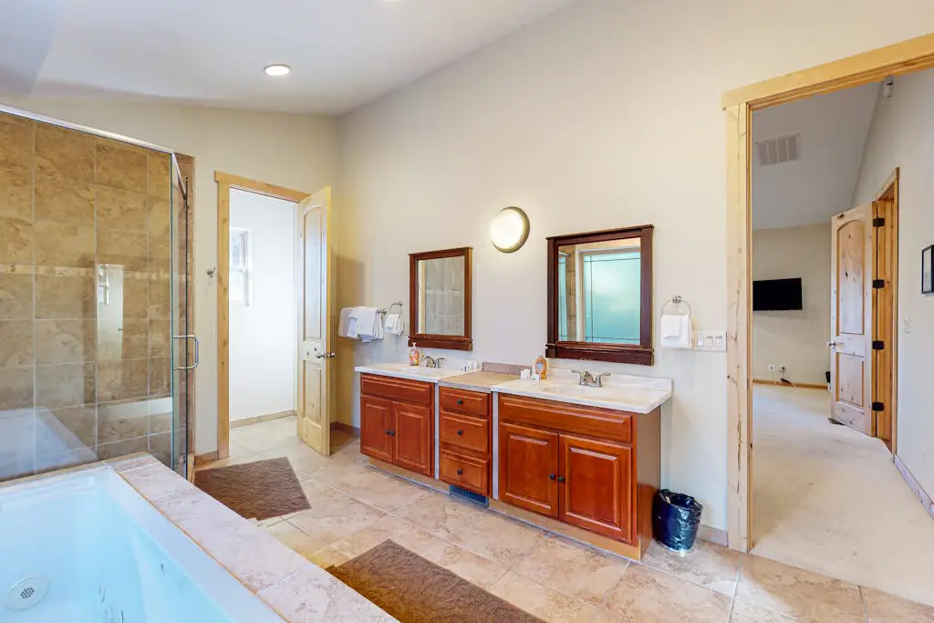 Dog-friendly home near lake with hot tub, pool table, fireplace, & W&D