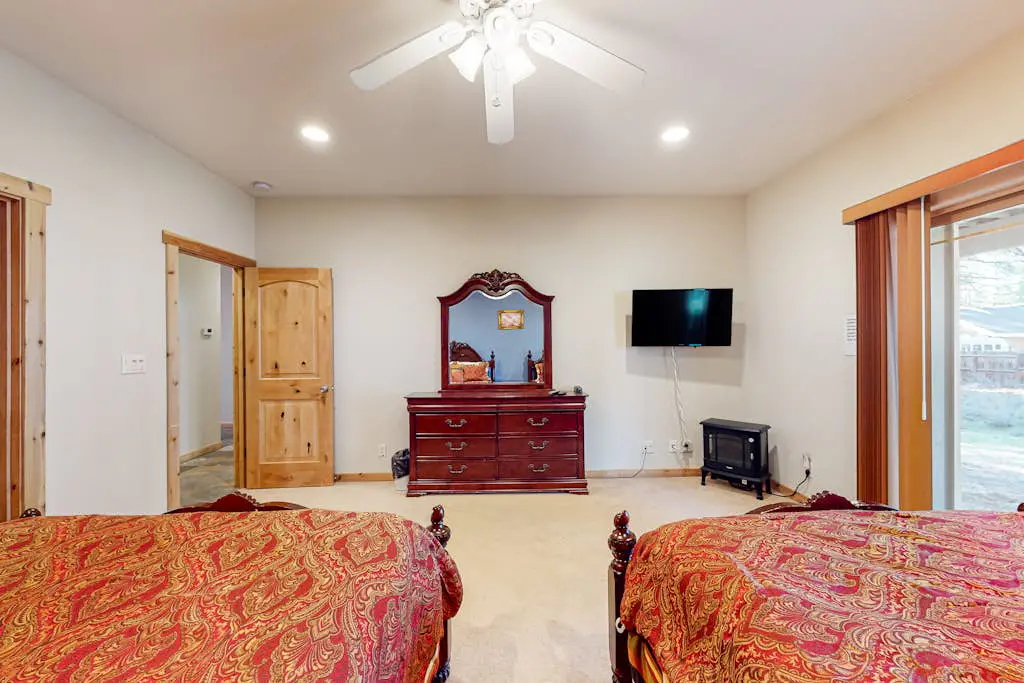 Dog-friendly home near lake with hot tub, pool table, fireplace, & W&D