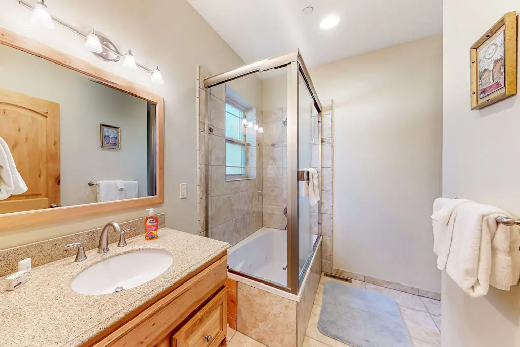 Dog-friendly home near lake with hot tub, pool table, fireplace, & W&D