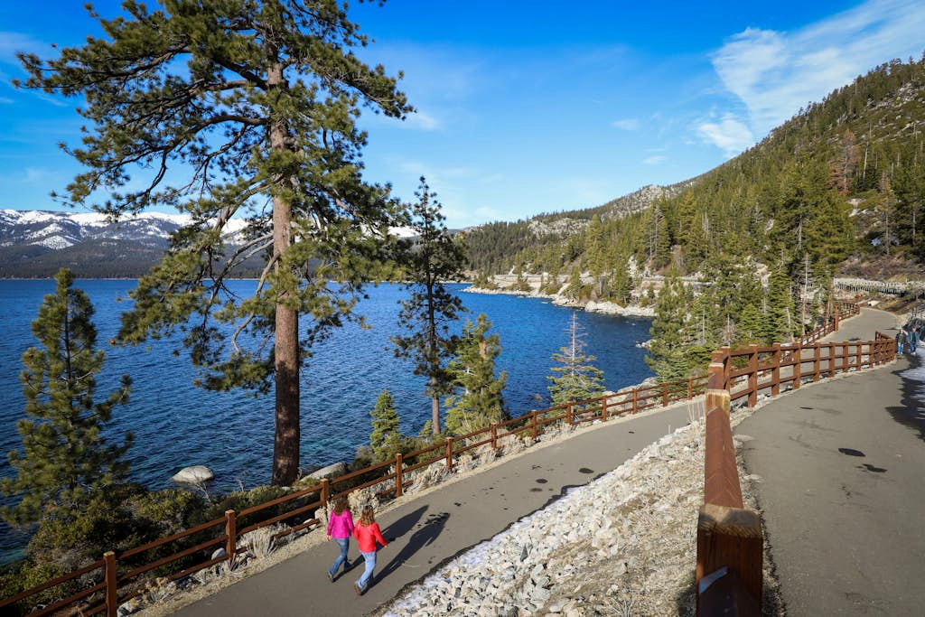 Spacious townhome with creekside patio & gas fireplace - 10-minute walk to lake