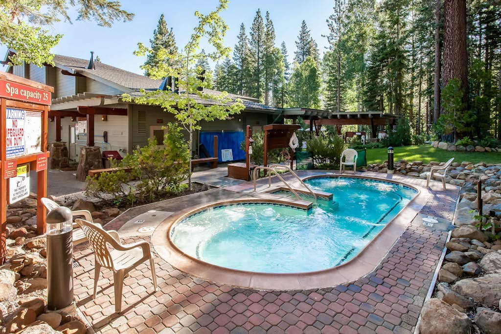 Rustic-chic condo with pool, sauna, hot tub, tennis, fireplace, game room & deck