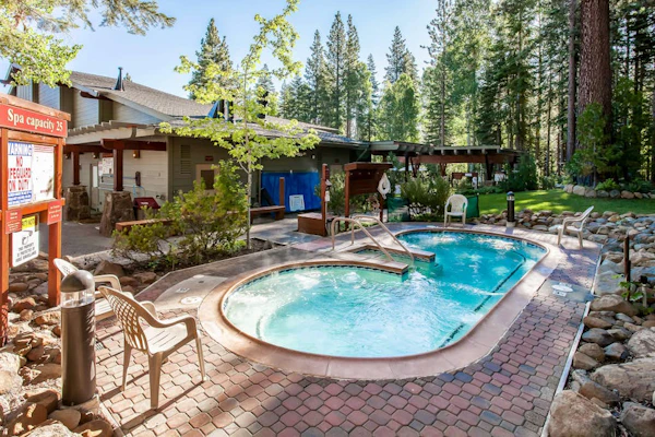 Rustic-chic condo with pool, sauna, hot tub, tennis, fireplace, game room & deck