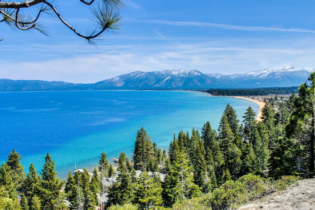 Escape to Country Club Retreat, a stunning house in South Lake Tahoe, California, perfect for your next getaway! This spacious holiday home boasts 4 bedrooms and 3 bathrooms, ideal for families or groups. Enjoy the mountain views, cozy up by the indoor fireplace, and take advantage of amenities like a BBQ grill, kitchen, and free parking. With its prime location, you're close to casinos, shopping, and outdoor adventures like golf, hiking, and fishing. Book your stay and create lasting memories!