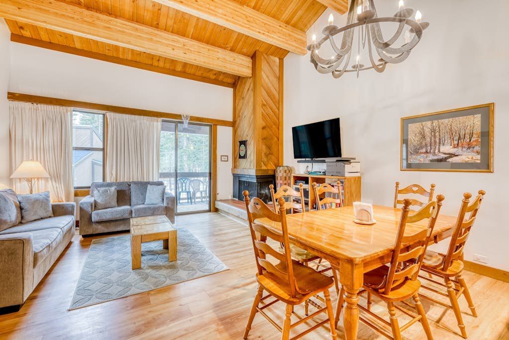 Condo with fireplace, balcony, washer/dryer, hot tub, & basketball/tennis courts