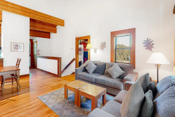 Condo with fireplace, balcony, washer/dryer, hot tub, & basketball/tennis courts