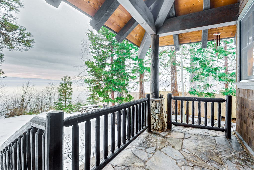 Beautiful lakefront home with dock, stone fireplace, W/D, and nearby activities