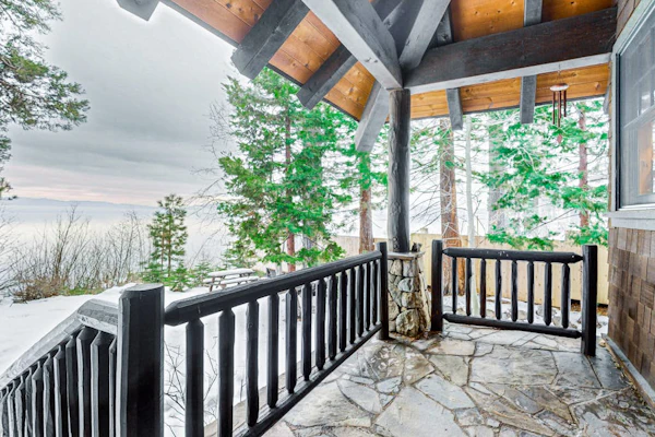 Beautiful lakefront home with dock, stone fireplace, W/D, and nearby activities