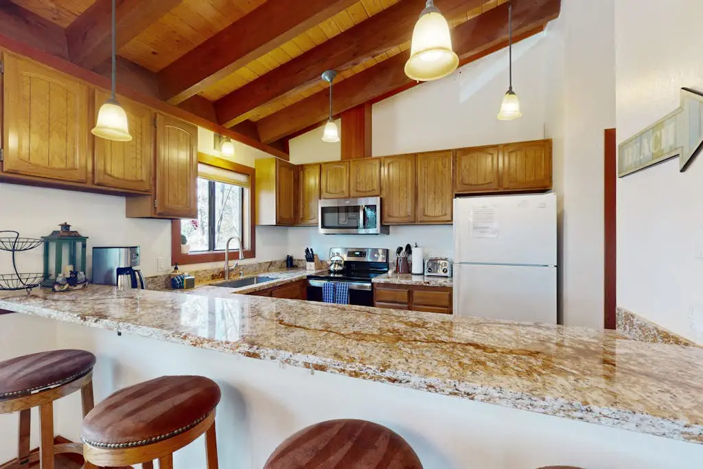 Lovely tree-view condo with deck, grill, & fireplace - near Tahoe City & lake