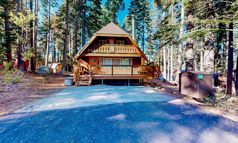 Two-story cabin with a wood fireplace, washer/dryer, & decks