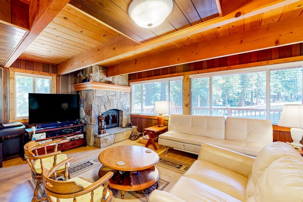 Two-story cabin with a wood fireplace, washer/dryer, & decks