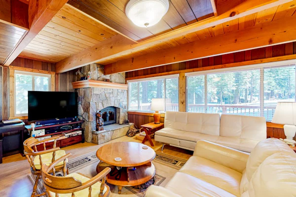 Two-story cabin with a wood fireplace, washer/dryer, & decks