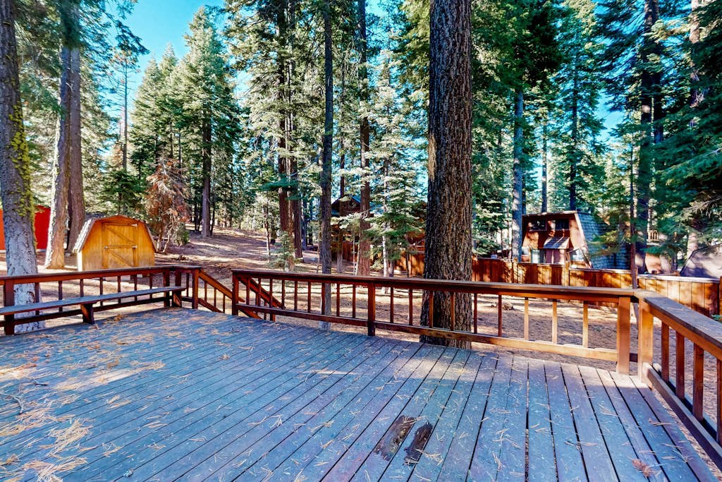 Two-story cabin with a wood fireplace, washer/dryer, & decks