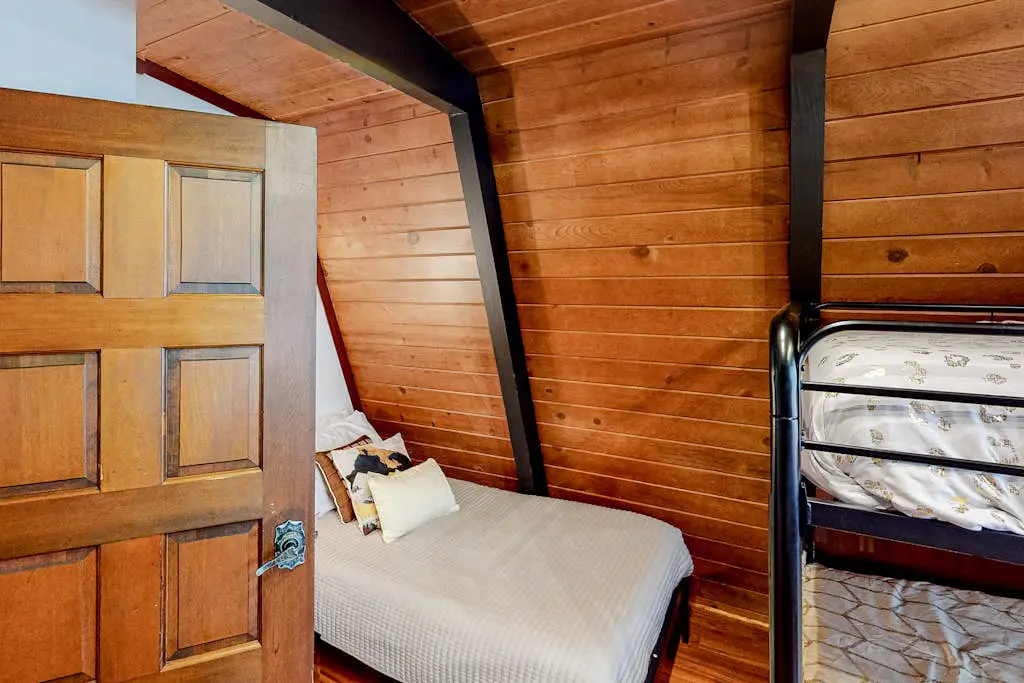 Quiet, dog-friendly home in the woods with deck & fireplace - near the lake