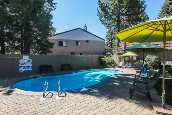 Condo with private beach, pool access, fireplace, WiFi, and nearby amenities