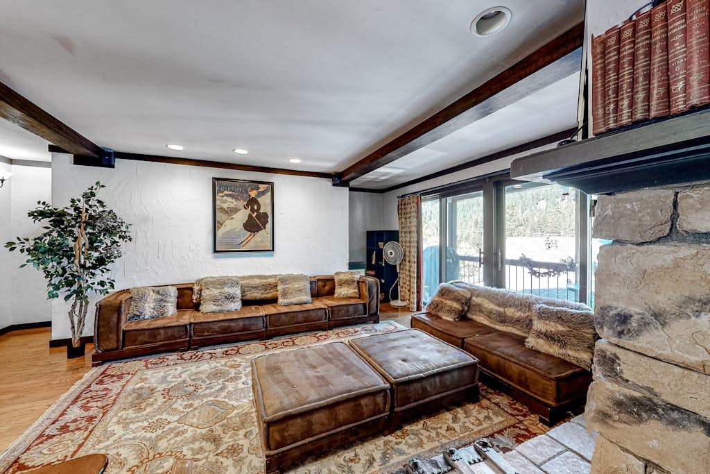 Ski getaway with amazing mountain views, fireplace, pool, & river path access