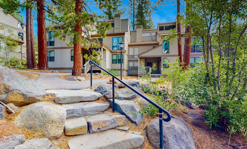 Creekside retreat with pool access, deck, fireplace, and high speed WiFi